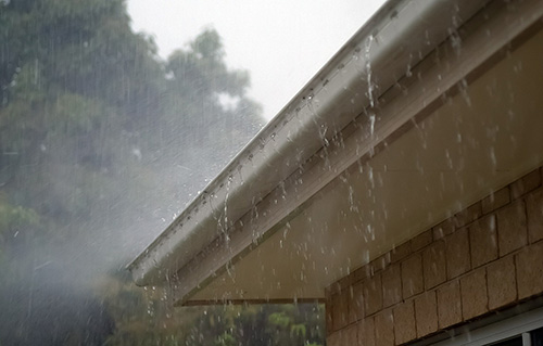 The Most Common Reasons Gutters & Downspouts Overflow - Able Roof