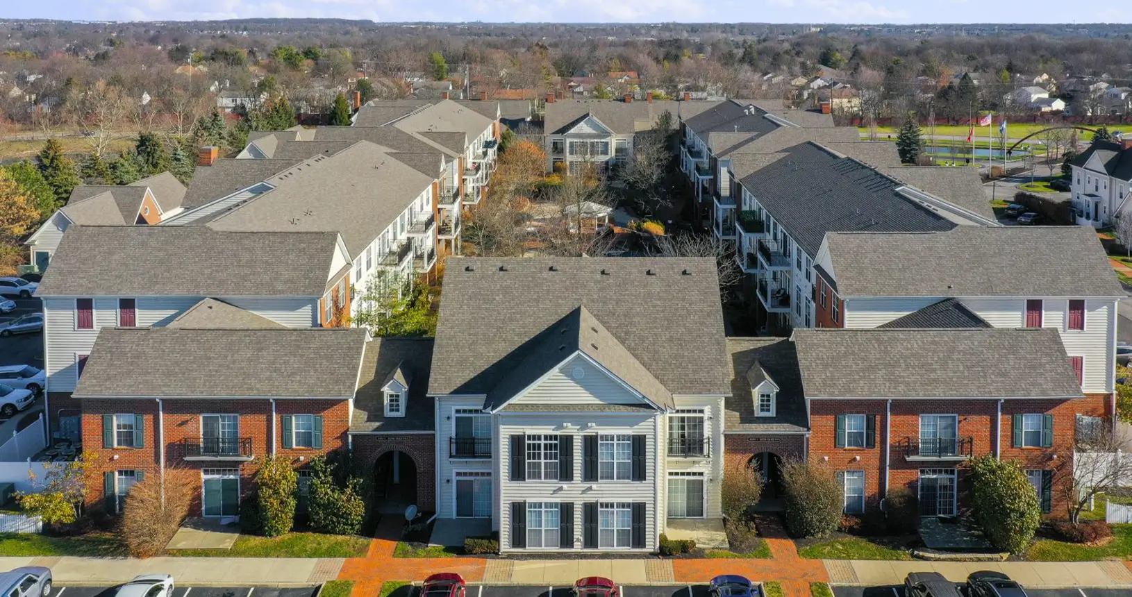 Updated shingle commercial roofing installation for the multi-family Times Square Apartments in Dublin.