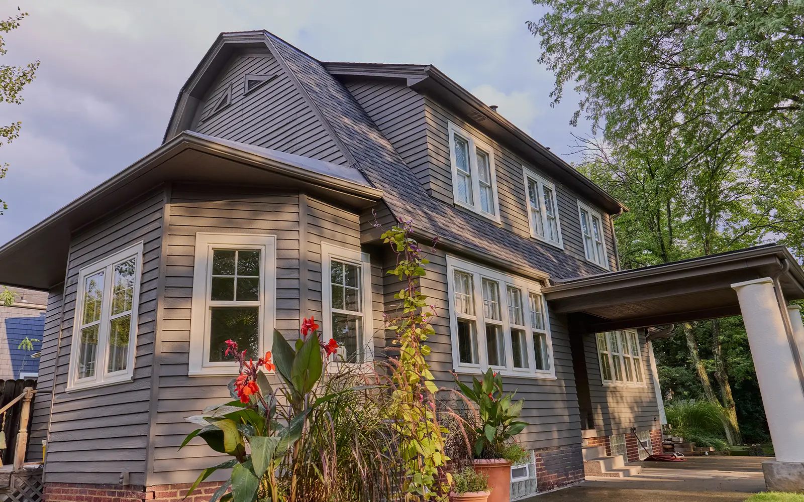 A new roof installation completed by Able Roofing featuring a hybrid asphalt and low slope roof.